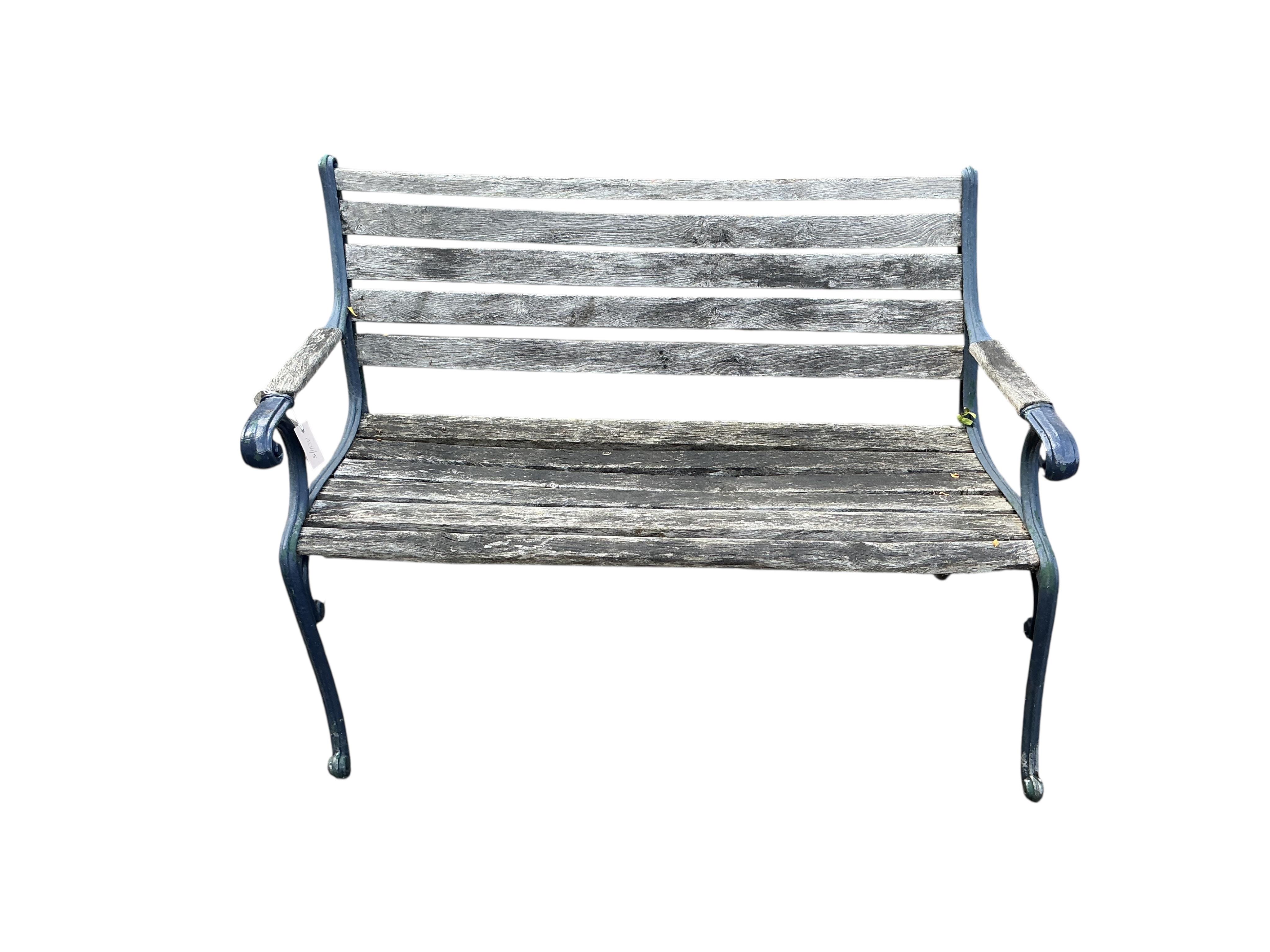 A cast metal slatted garden bench, width 115cm, together with three matching garden armchairs and four bench ends